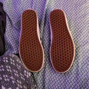 Black and white checkered print slip on vans